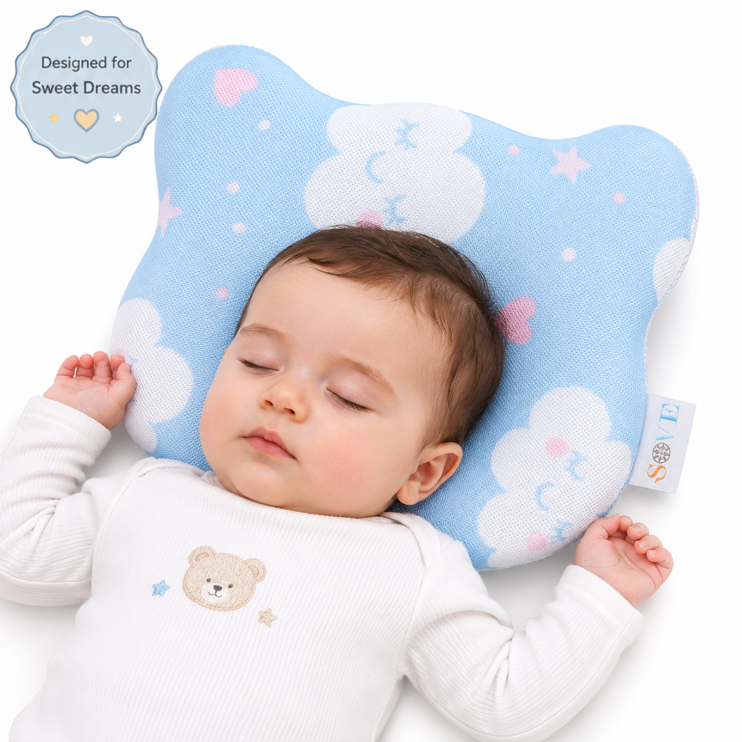 Baby sleeping on Sove Blue Clouds and Stars memory foam head shaping pillow