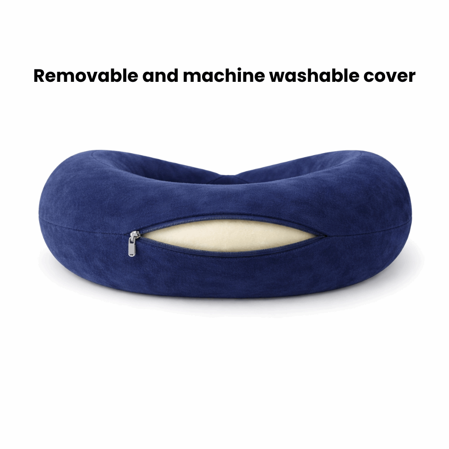 Blue travel pillow with a white zipper on a white background, featuring text about a removable cover.